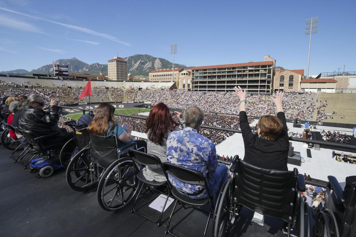 Attendees sitting in ADA seating.