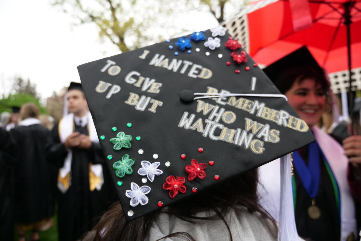 A cap that reads, "I wanted to give up but I remembered who's watching"