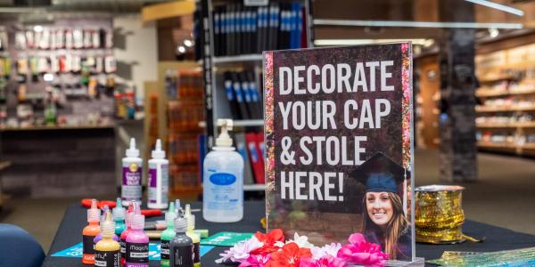 A station set up on campus for cap decorating