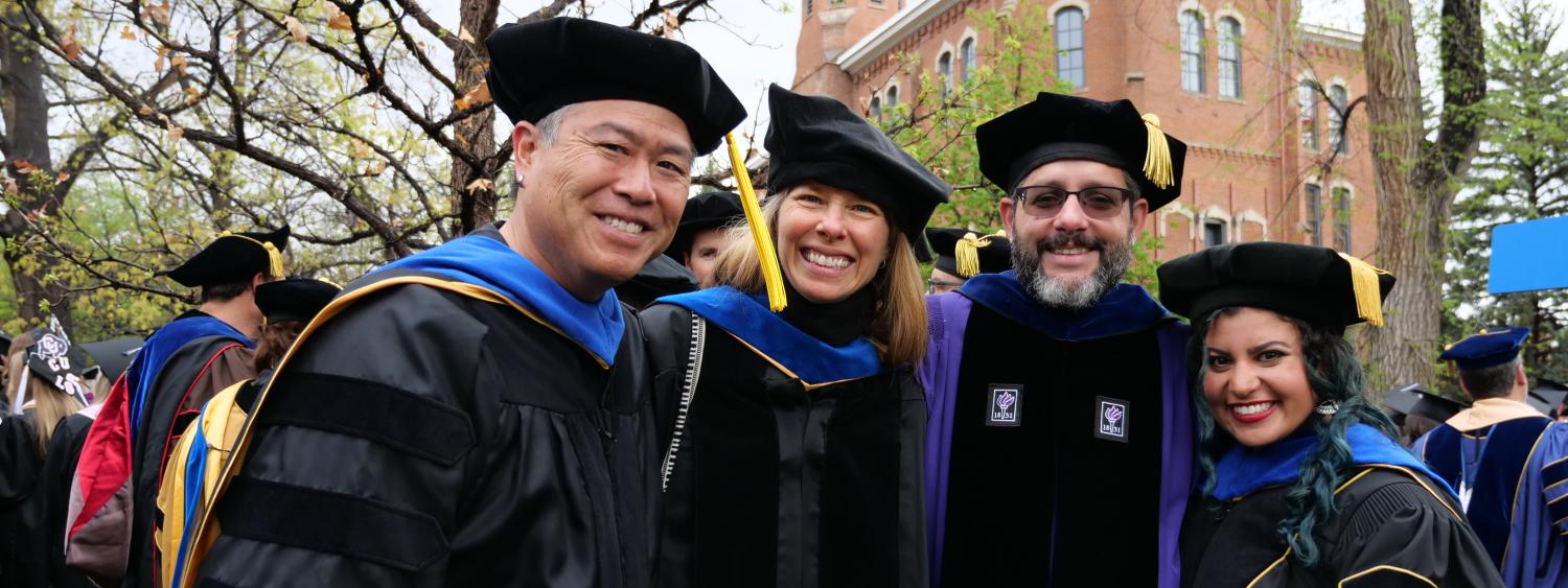 Faculty getting ready for the procession