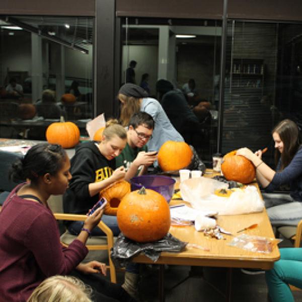 Students carve pumpkins in Buckingham