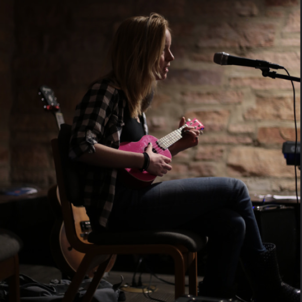 students perform at the open mic night