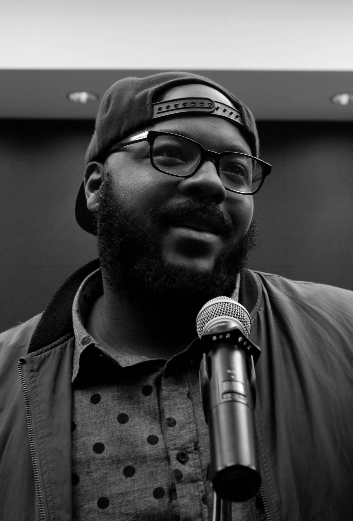 Nate Marshall performs for the COMM RAP communtiy