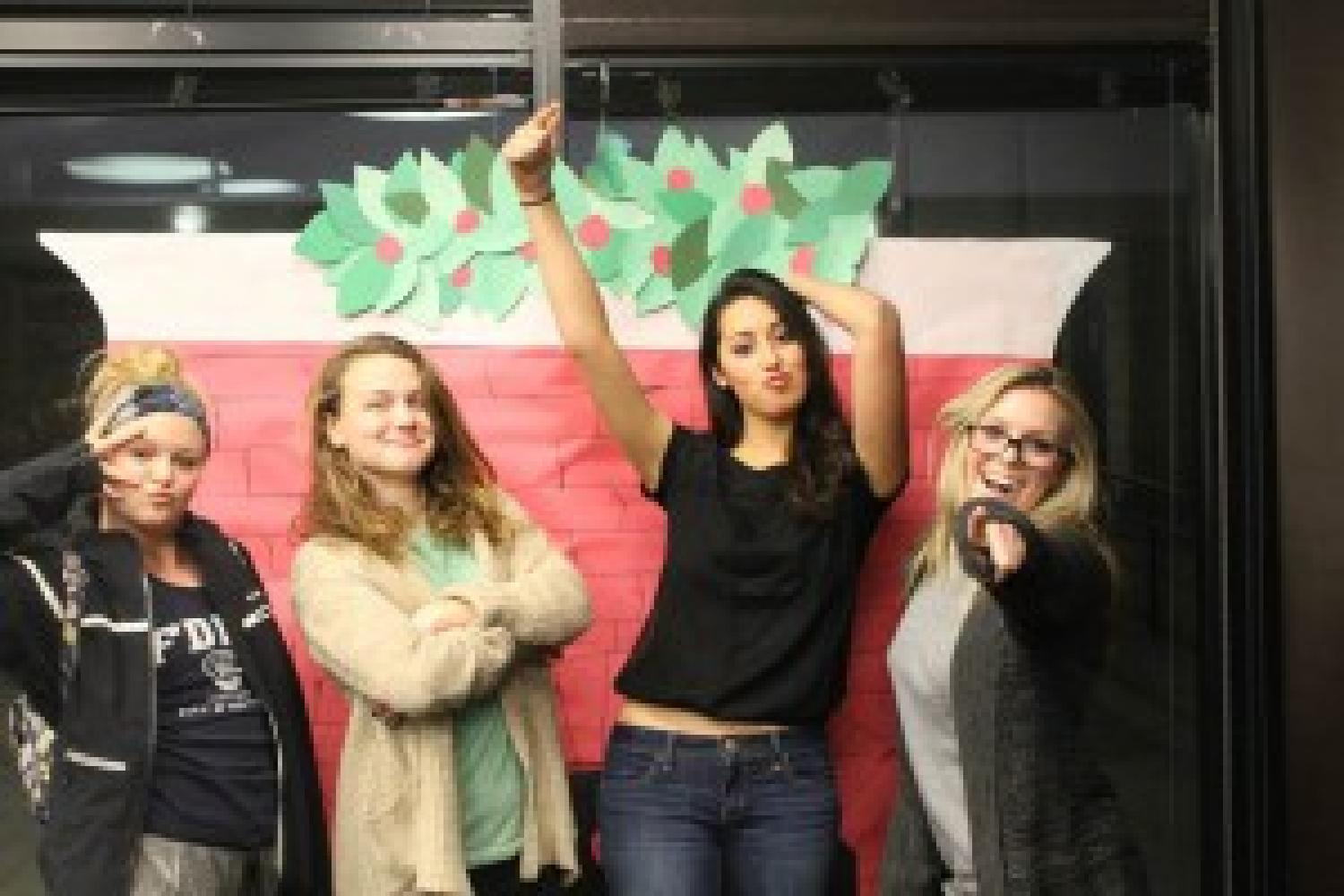 students celebrate at the holiday party