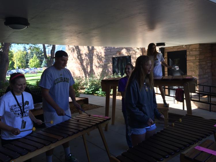 Students learn some tunes on the marimbas