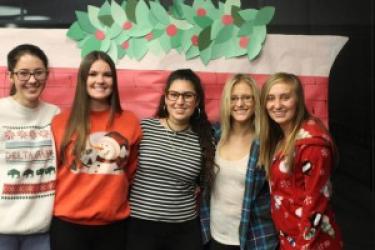 students celebrate at the holiday party