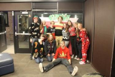 students celebrate at the holiday party