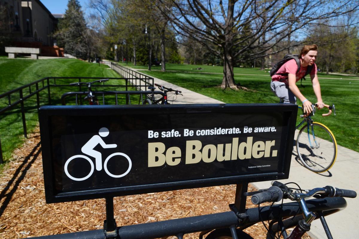 Be Boulder Sign with biker