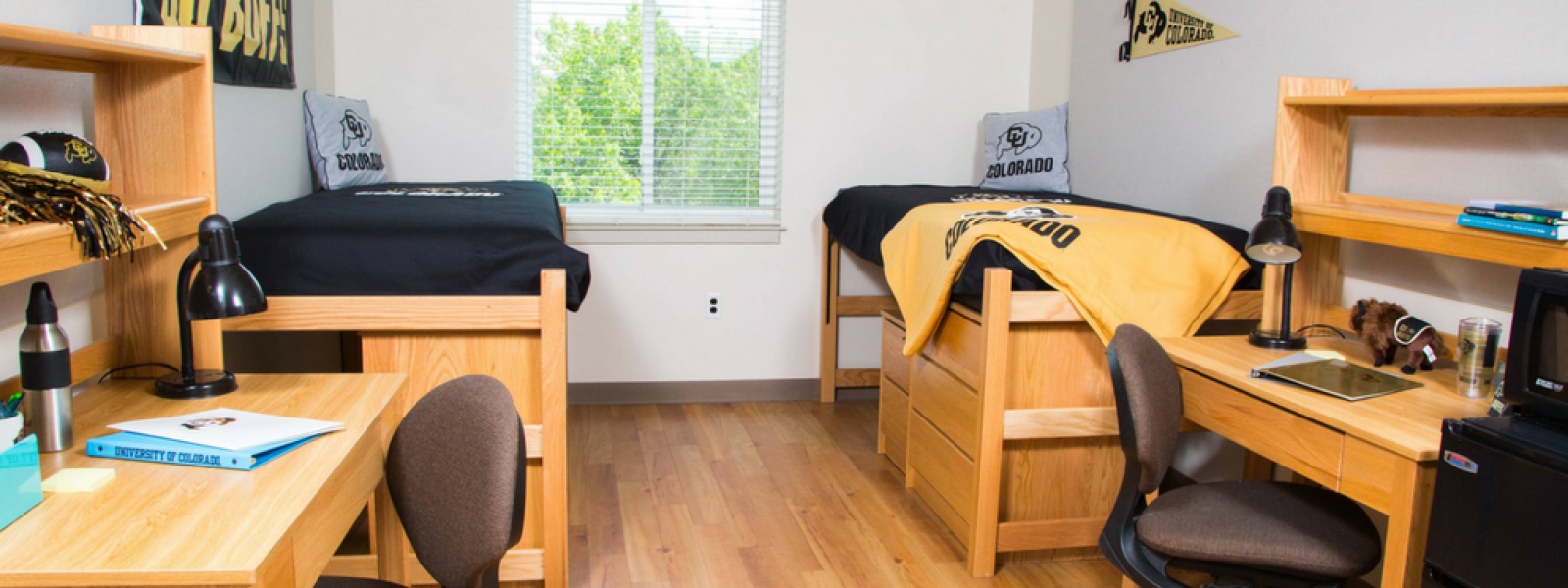 Double Will Vill North room with two beds, desks, chairs, dressers