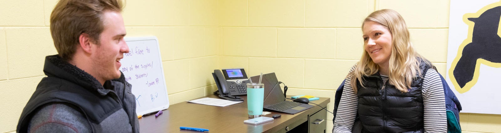 Photo of a counseling speaking with a student during an individual counseling session.