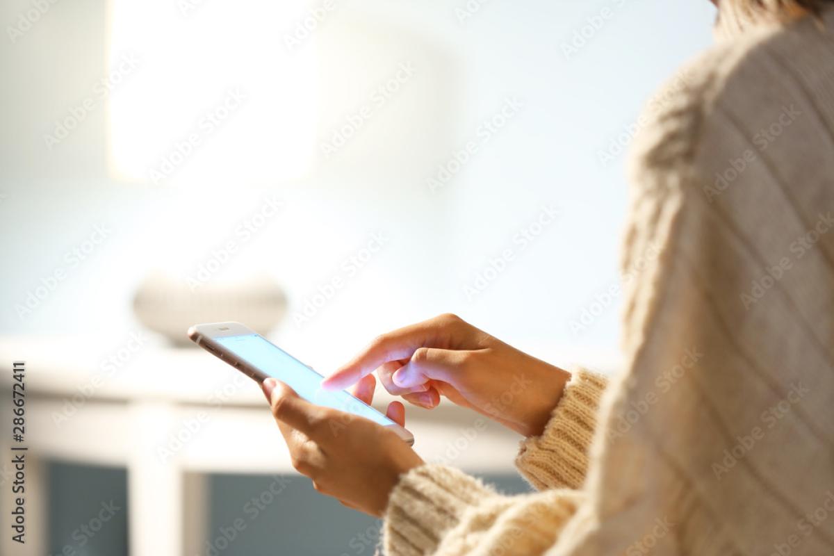 Photo of a person using the WellTrack app.