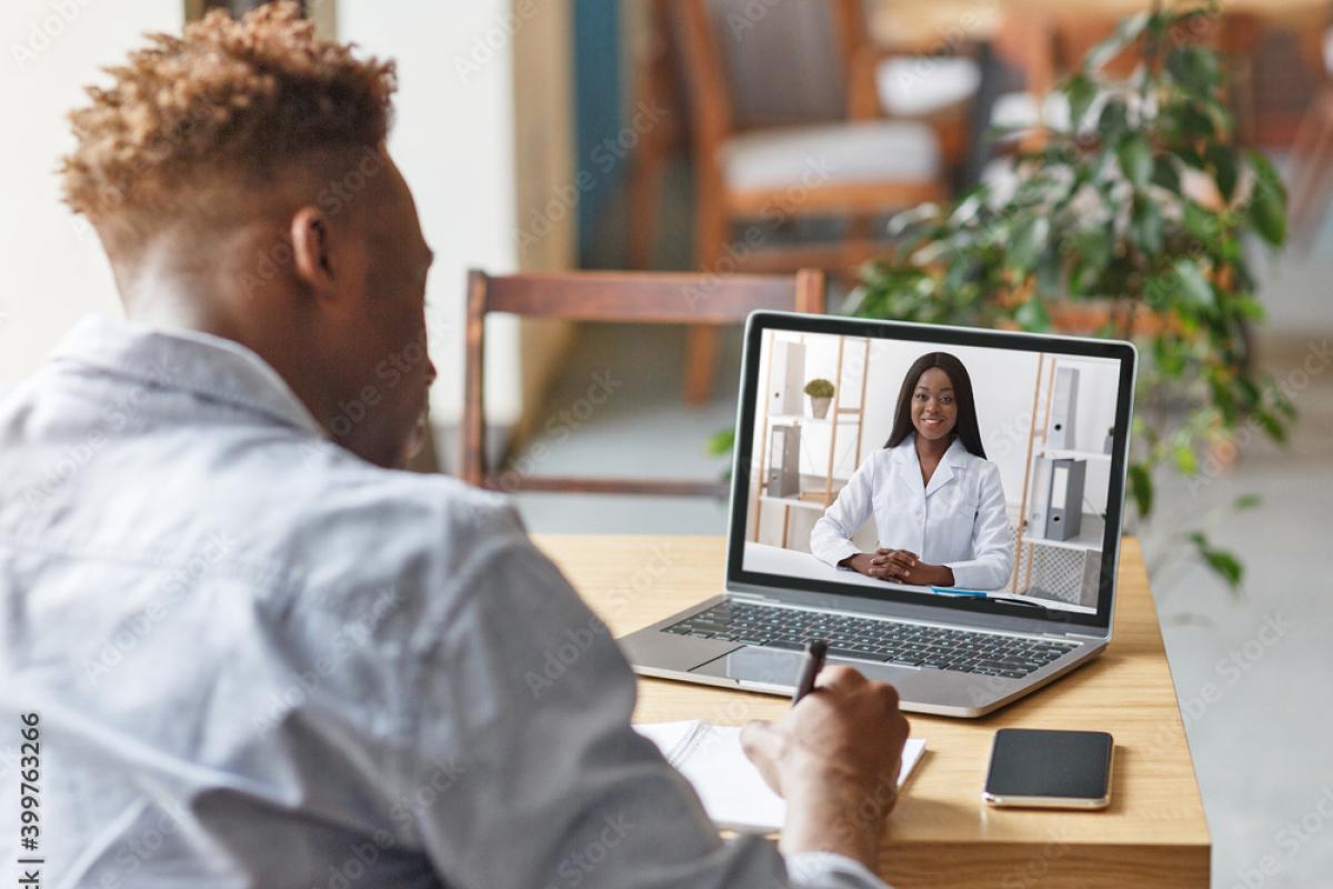 Photo of a student attending a free virtual appointment with a counseling provider.