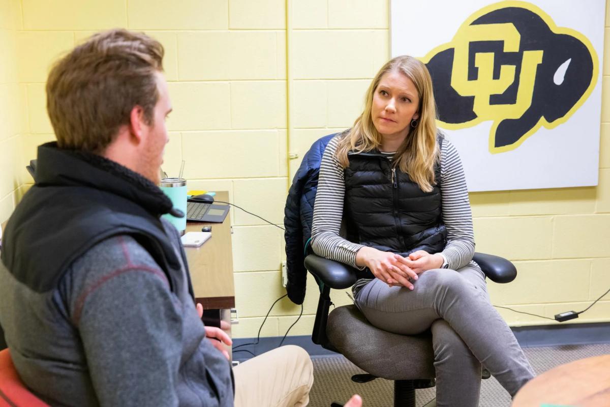 Photo of a student meeting with a let's talk provider during drop-in hours.