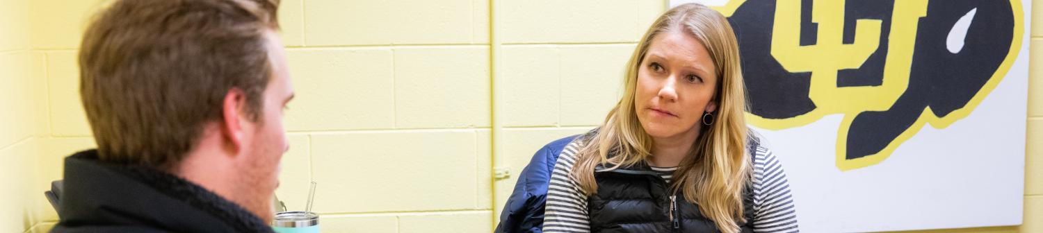 a student speaking with a counselor