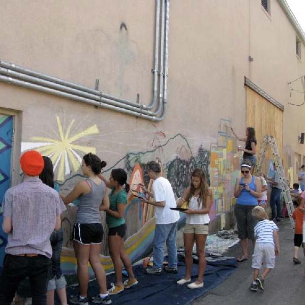 Photo of students painting mural