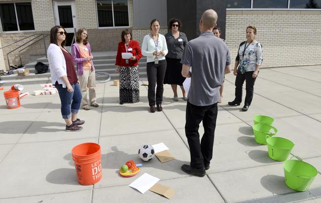 Linz Craig teaches the "Running the Code Obstacle Course" class during the Computing by Design Symposium at Timberline K-8