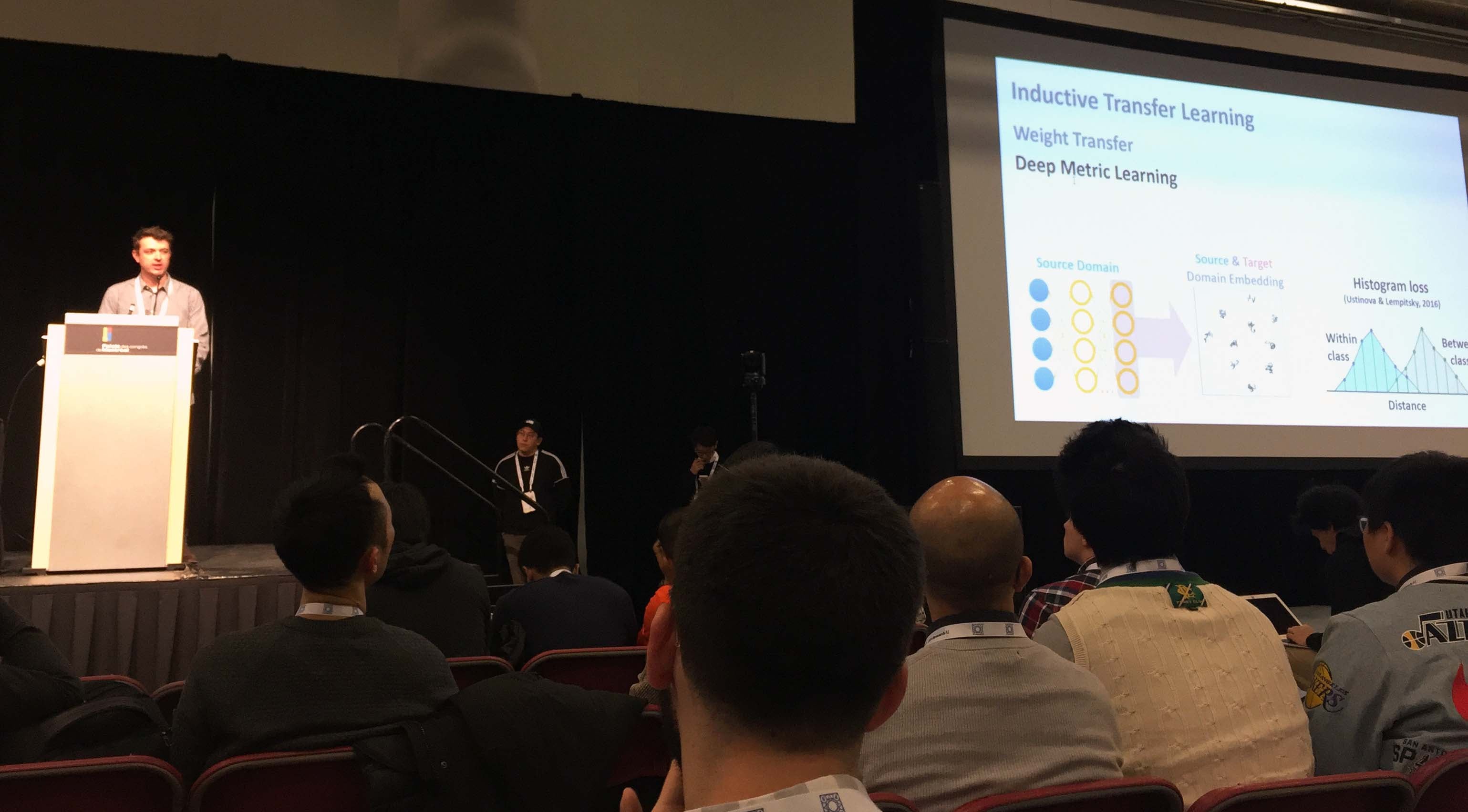 Scott presents his research at the NeurIPS conference in 2018. 