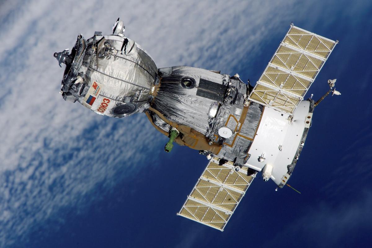 satellite over earth collecting data
