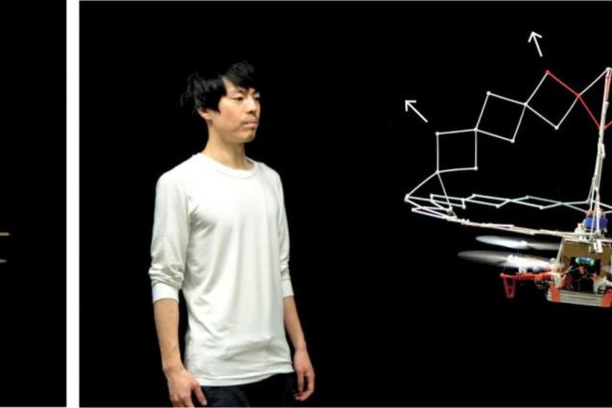 PufferBot extends its shield as it approaches a bystander.