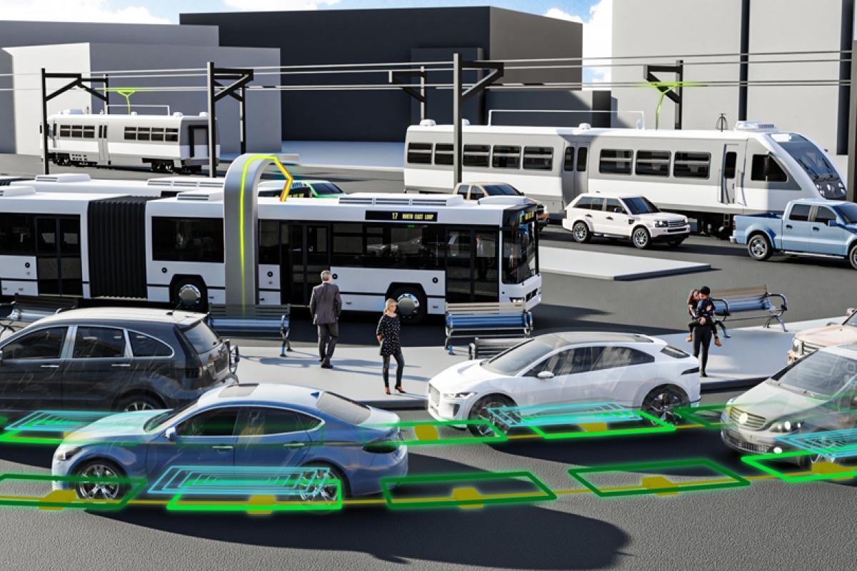 An illustration showing a street filled with electrified, networked buses and cars.