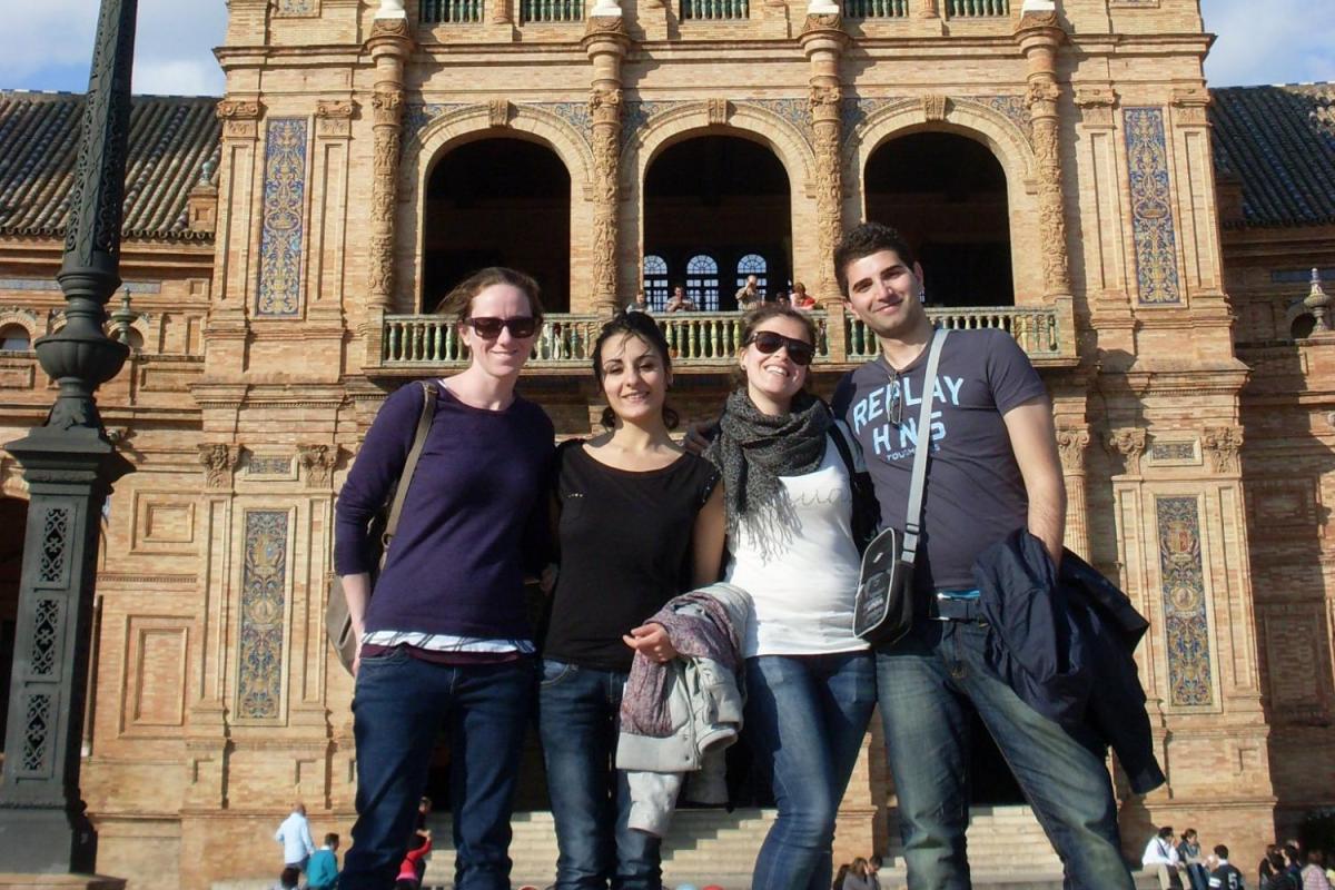 A group of students poses in the Plaza Espana in Seville, Spain.