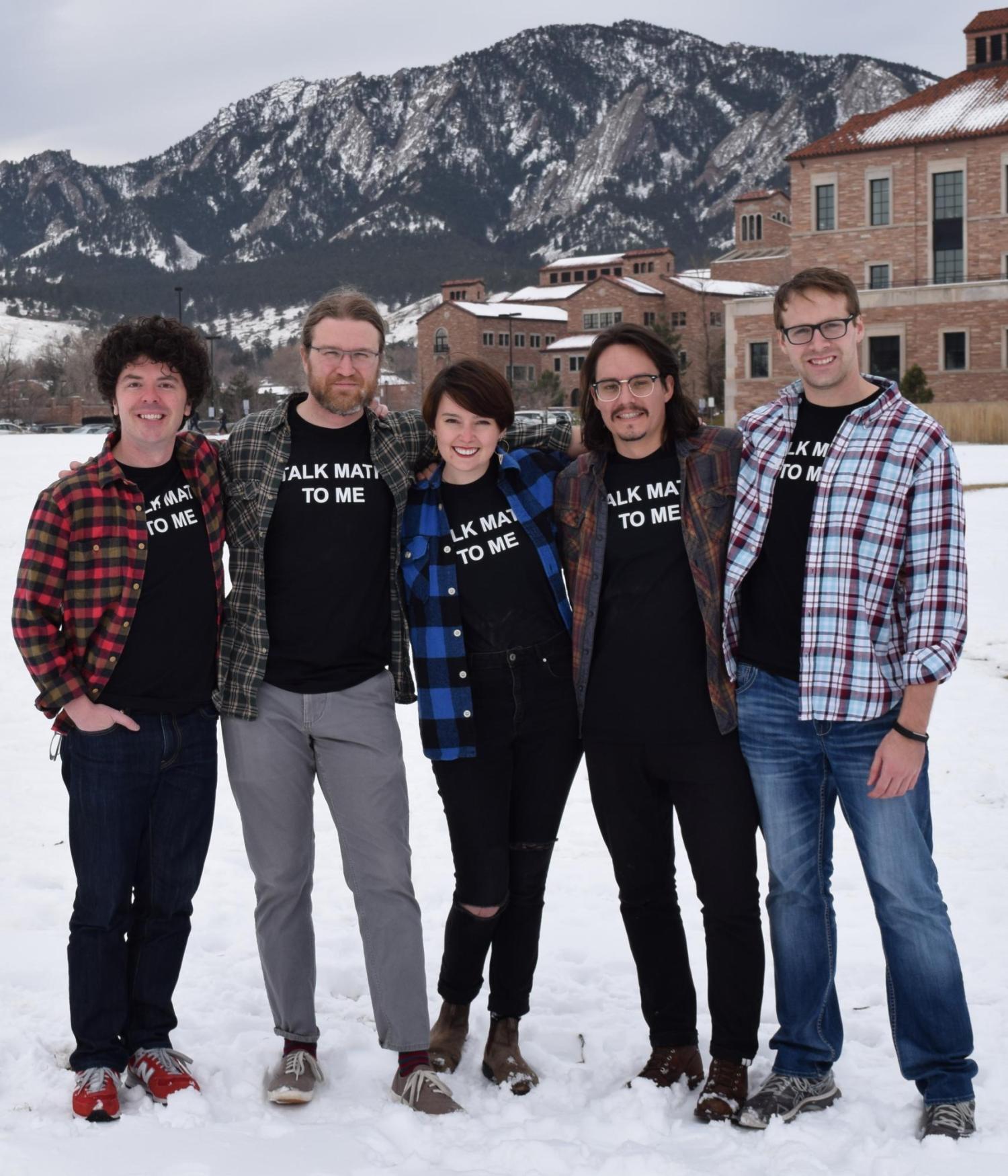Izzy Aguiar (center) with advisor Paul Constantine (left) and her fellow grad students.