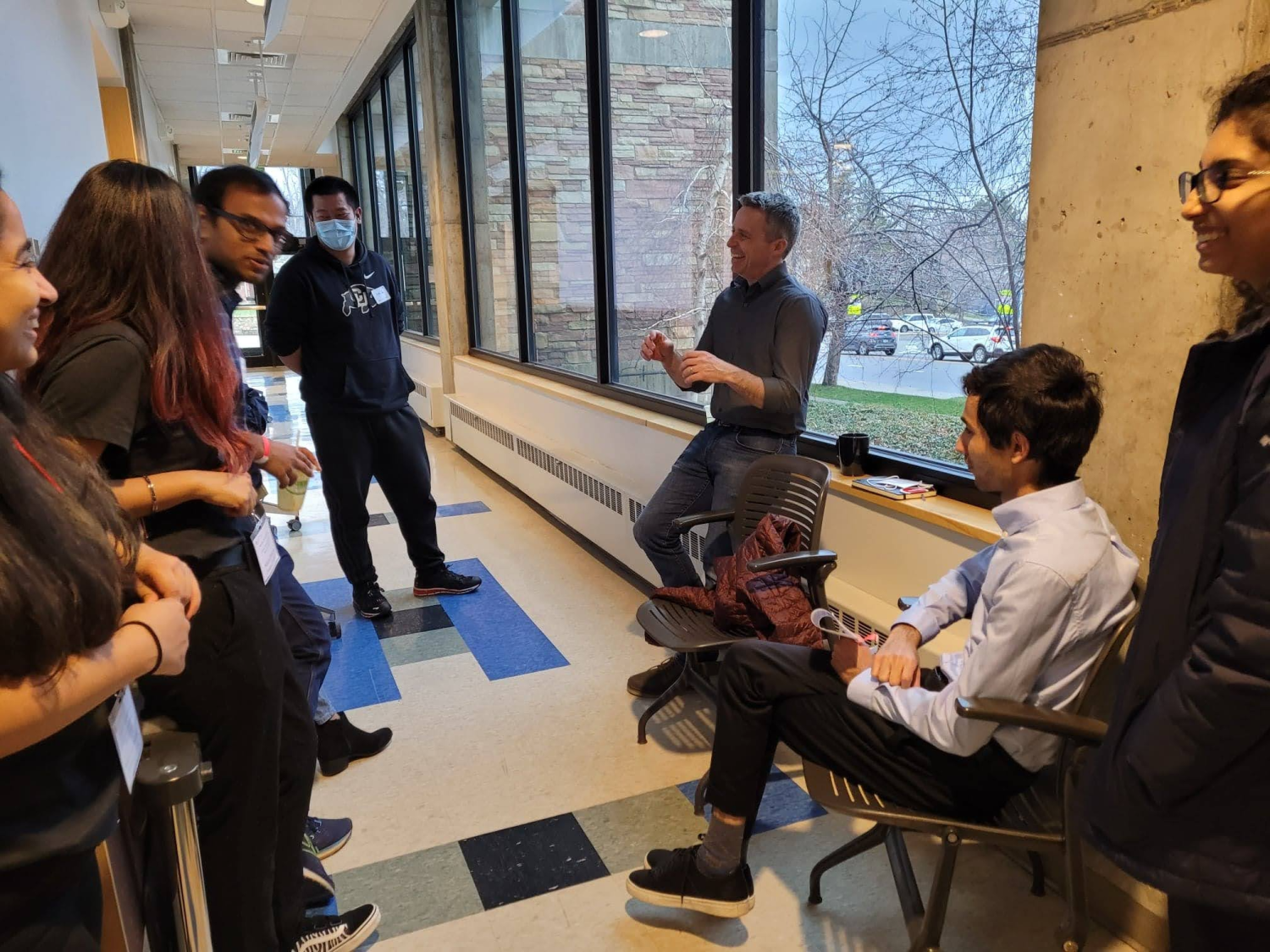 Students talk with industry representative