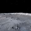 The surface of the moon, with empty space in the background