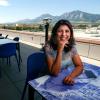 Bhavna on the balcony of the Google Boulder offices overlooking the Flatirons