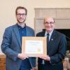Clauset receives his award from CU Boulder Chancellor Phil DiStefano