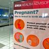 A Zika virus health advisory posted near an airport security checkpoint in San Juan, Puerto Rico, in 2016