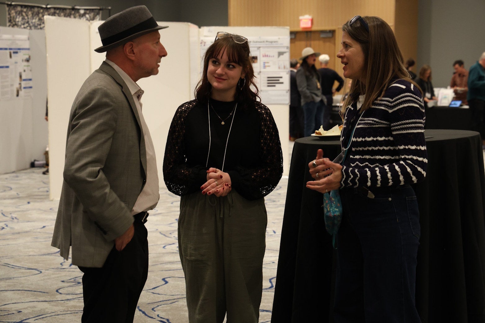 Participants and presenter caught mid discussion