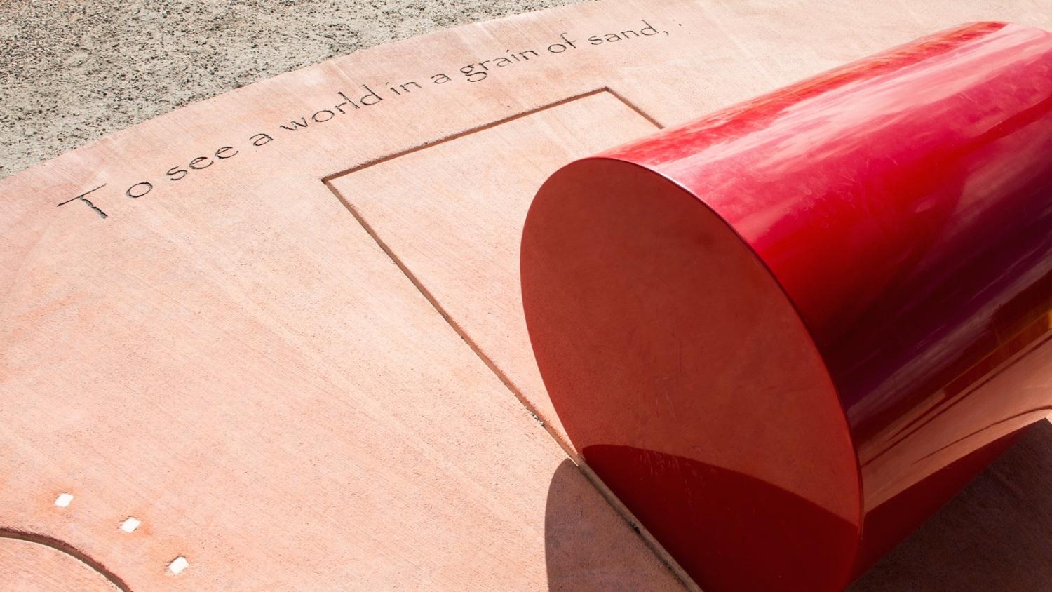 To see a world in a grain of sand - text in concrete.