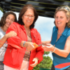 Geralyn Romero cuts ribbon next to Beth Stade at Geometry Park Opening