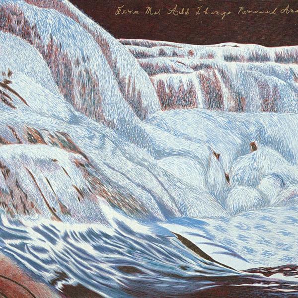 A print of a blue waterfall in a red landscape.