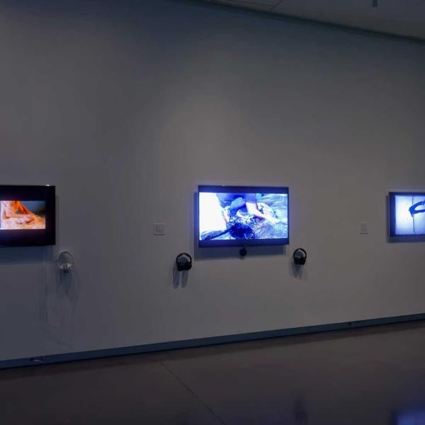 Installation view of the Interlaced exhibition showing TV screens