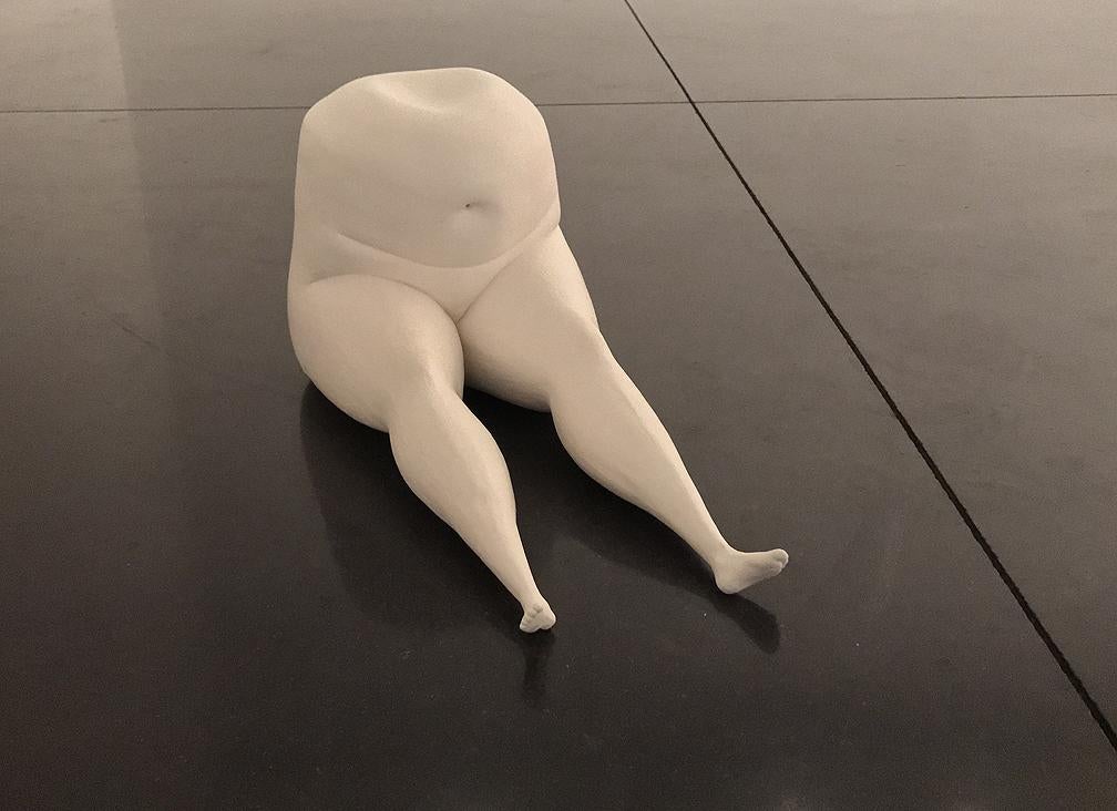 A small ceramic pair of legs
