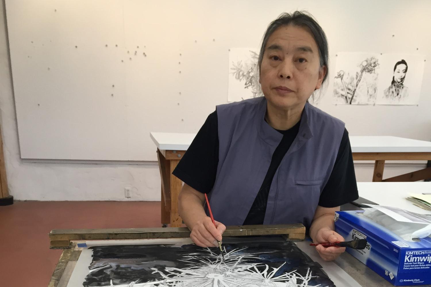 Hung Liu at work in the studio