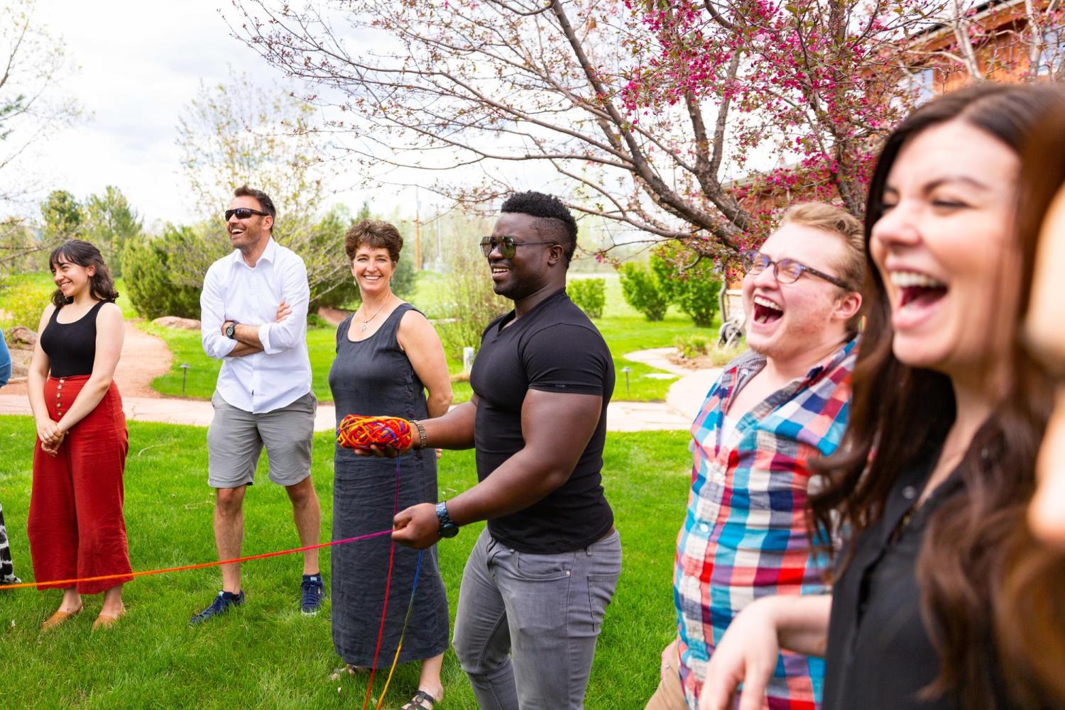 People laughing in a circle