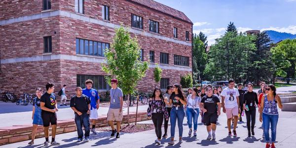 Students walking outside on campus