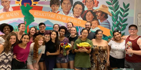 Students in front of mural