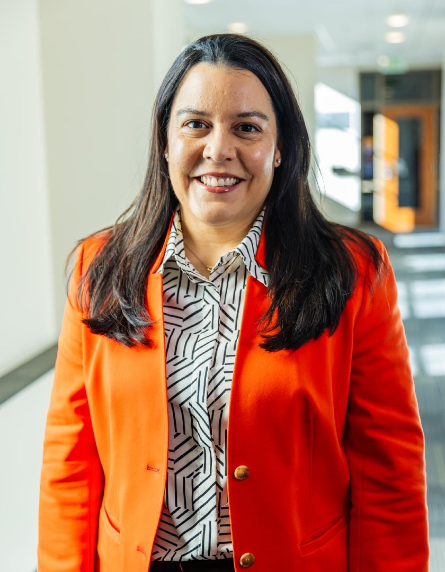 Maria J. Genao-Homs
