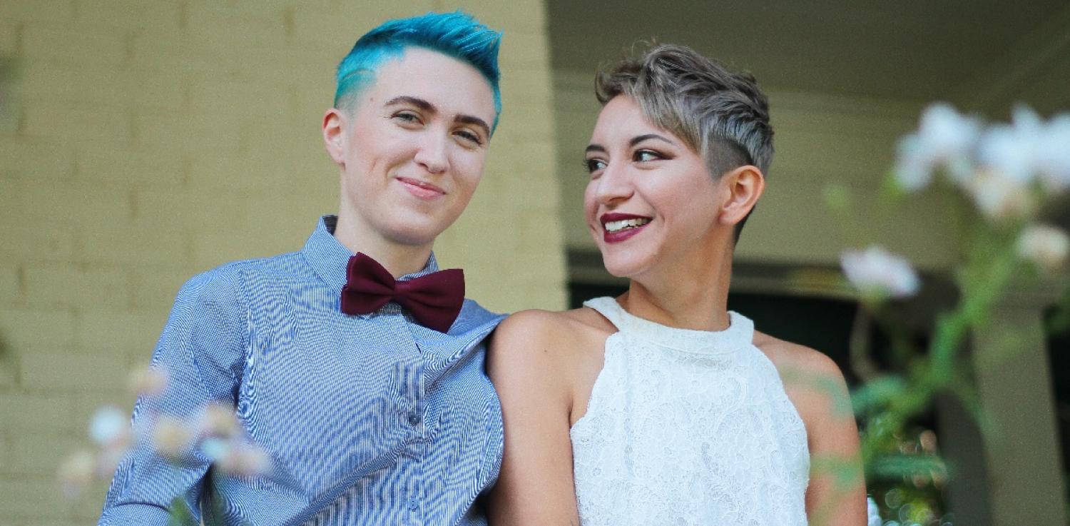 Couple posing and smiling