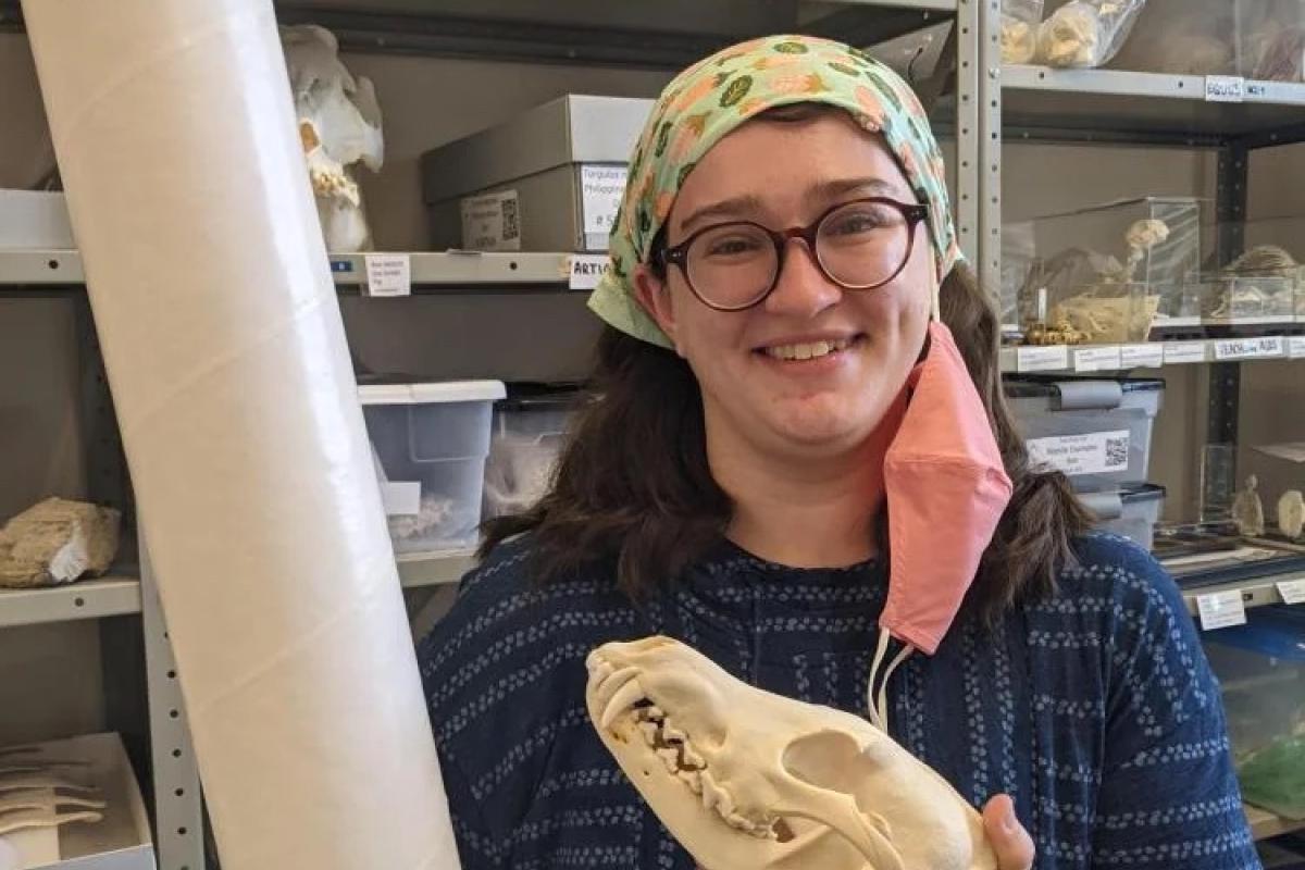 Sasha holding animal skull