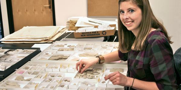 student examining specimens