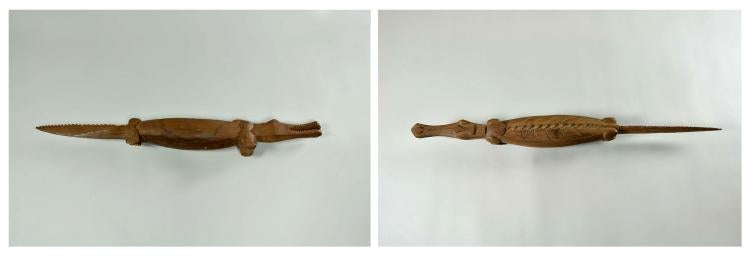 Hand-carved crocodile made of wood.