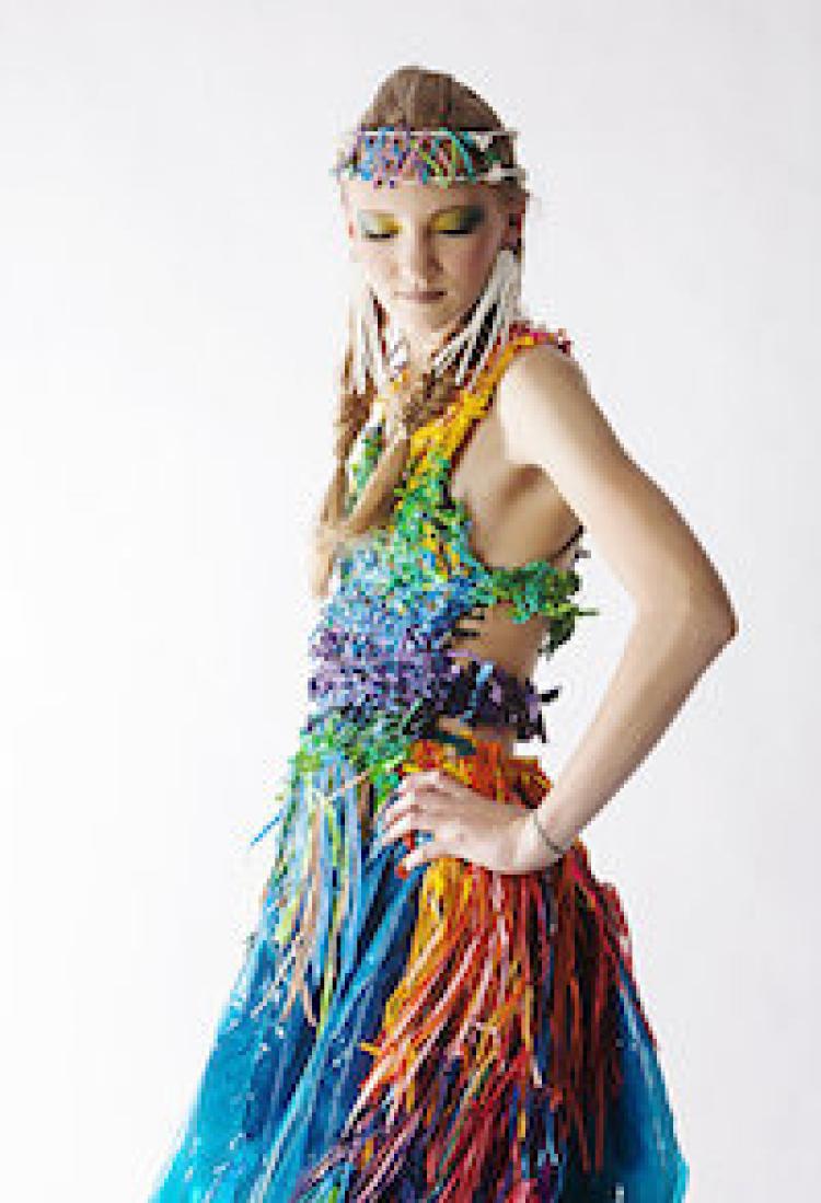 Girl in dress made from recycled materials