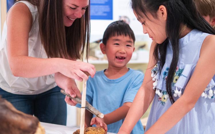 Volunteer helping child