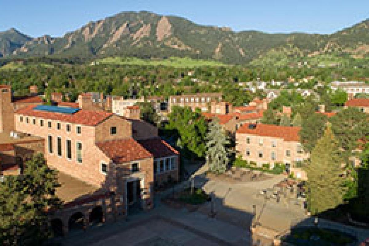 aerial of the University Memorial Center with the Flatirons in the background