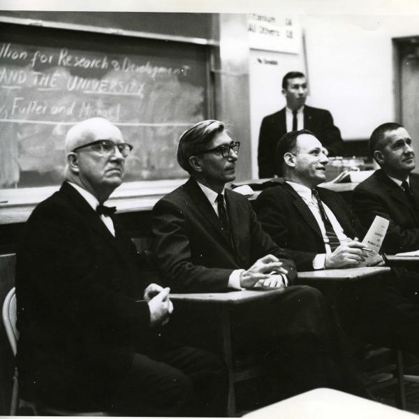 Buckminster Fuller (far left) and Harold Agnew (far right) participate in a CWA panel on campus